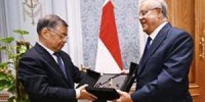 المستشار الدكتور حنفي جبالي يستقبل عضو المكتب السياسي للحزب الشيوعي الصيني